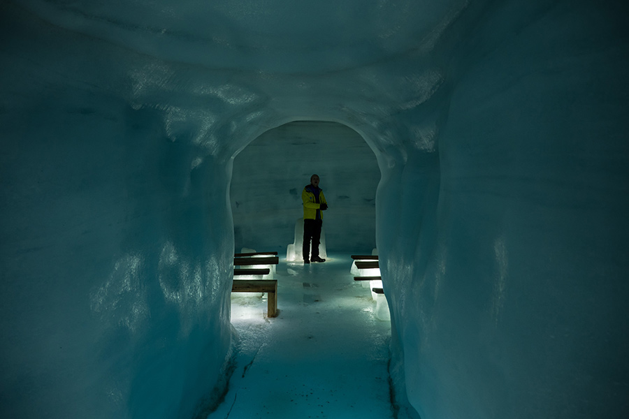 The singing guide in the chapel in the center of the glacier.